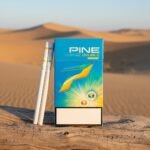 ซองบุหรี่ Pine Prime Fresh Mango วางคู่กับมะม่วงสุกและน้ำแข็ง สื่อถึงความเย็นสดชื่น